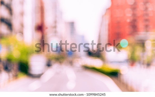 Abstract blur image of  Road on day time \
with bokeh for background usage . (vintage\
tone)