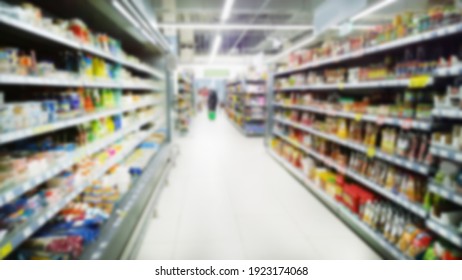 Abstract Blur Image Of Supermarket Background. Defocused Shelves With Fresh Products. Grocery Shopping. Store. Retail Industry. Food Quality. Rack. Discount. Inflation And Crisis Concept. Aisle.