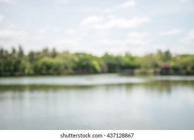 Abstract Blur Lake In City Park Bokeh Background