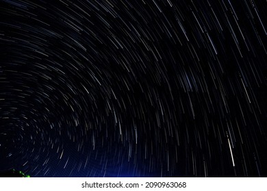 Abstract blur of Light trals star orbit on sky, for background star. - Shutterstock ID 2090963068