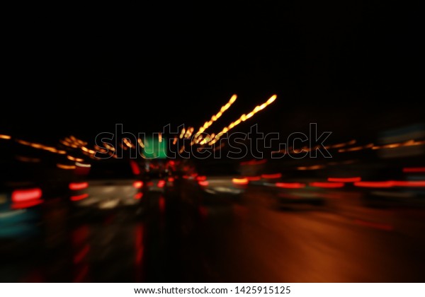 Abstract Blur of lighting on\
the road