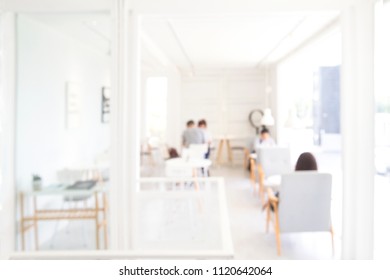 Abstract Blur Luxury Coffee Shop Cafe And Restaurant Interior For Background , Warm And Clean Lifestyle