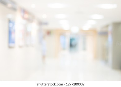 Abstract Blur Luxury Hospital Corridor. Blur Clinic Interior Background With Defocused Effect. Healthcare And Medical Concept