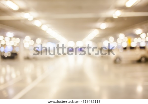 Abstract blur\
parking car indoor for\
background