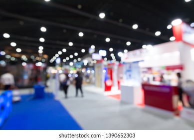 Abstract blur people in exhibition hall event trade show expo background. Large international exhibition, convention center, MICE industry business concept