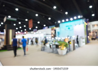 Abstract Blur People In Exhibition Hall Event Trade Show Expo Background. Large International Exhibition, Convention Center, Business Marketing And Event Fair Organizer Concept.