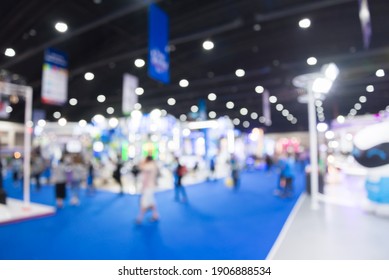 Abstract blur people in exhibition hall event trade show expo background. Large international exhibition, convention center, business marketing and event fair organizer concept. - Shutterstock ID 1906888534