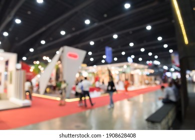 Abstract blur people in exhibition hall event trade show expo background. Large international exhibition, convention center, business marketing and event fair organizer concept. - Shutterstock ID 1908628408