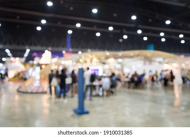 Abstract blur people in exhibition hall event trade show expo background. Large international exhibition, convention center, business marketing and event fair organizer concept. - Shutterstock ID 1910031385