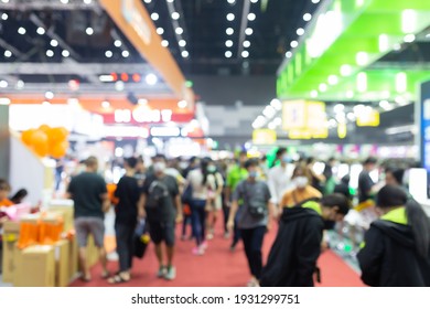 Abstract blur people in exhibition hall event trade show expo background. Business convention show, job fair, or stock market. - Shutterstock ID 1931299751