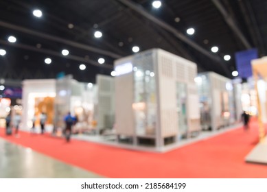 Abstract blur people in exhibition hall event trade show expo background. Home furniture fair expo, business marketing and event fair organizer concept.