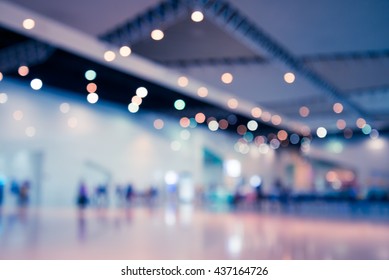 Abstract blur people in exhibition hall event background - Shutterstock ID 437164726