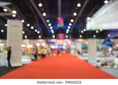 Abstract blur people in exhibition hall event background - Shutterstock ID 598342223