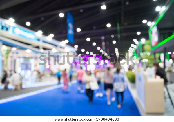 Abstract blur
people in exhibition hall event trade show expo background. Large
international exhibition, convention center, business marketing and
event fair organizer
concept.