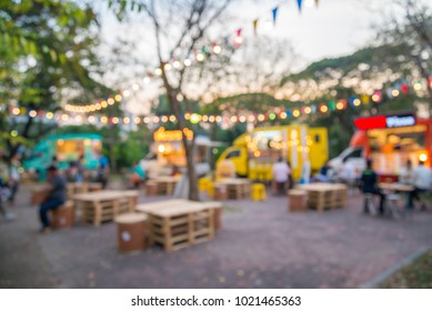 Abstract Blur People In Food And Drink Truck Night Festival City Park Bokeh Background