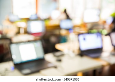 Abstract Blur People Lecture In Seminar Room With Notebook Or Laptop Computer, Education Or Business Training Concept