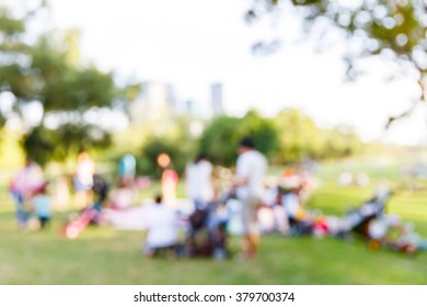 Abstract Blur People Picnic In Public Park With Family Or Friends, Urban Leisure Lifestyle