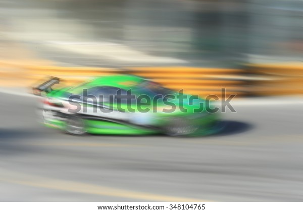Abstract blur\
of racing car motion blur on\
tracking.