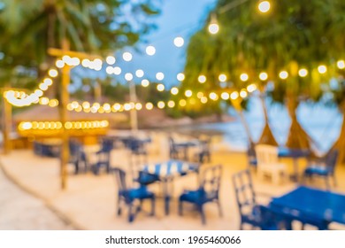 Abstract blur restaurant and bar around beach sea for background