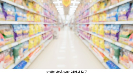 Abstract Blur Supermarket Discount Store Aisle And Pet Food Product Shelves Interior Defocused Background