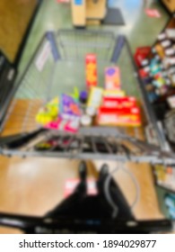 Abstract Blur Of Supermarket Shopping Cart, Top Down View.