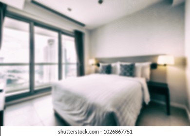 Abstract blur and vintage tone bedroom interior and decoration for background