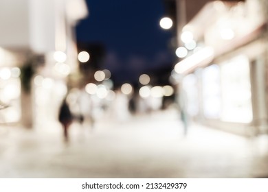 Abstract Blured Defocused Image Of European Cosy Street At Night With Beautiful Bokeh Lights. Great Backdrop For Your Design. Travel Concept. Copy Space.