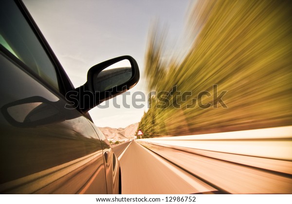 Abstract blurred\
action from car at high\
speed