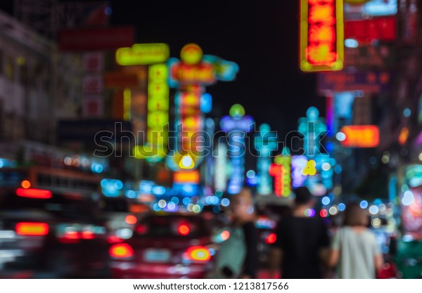 Abstract blurred background of\
China town nightlife with colorful neon signs. China town is one of\
the most popular place of night street food in Bangkok,\
Thailand
