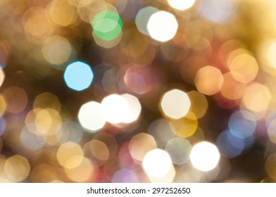 abstract blurred background - colorful brown shimmering Christmas lights bokeh of electric garlands on Xmas tree - Powered by Shutterstock