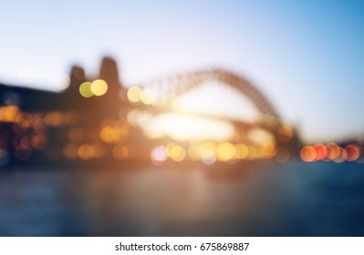 The Abstract Blurred Background (defocus) Of Sydney Harbour Bridge During The Sunset.