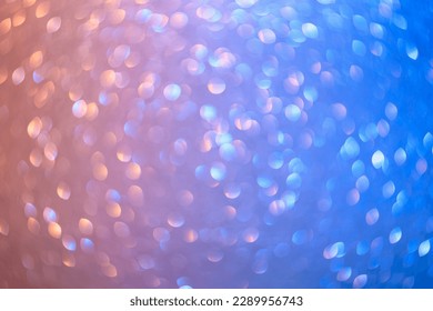 Abstract blurred background. Defocused portrait lens back. Backdrop bokeh. Design blank. Graphic resource for the designer. Fashionable mixed color light of warm and cool tones.