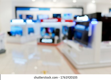 Abstract Blurred Background Electronic Department Store Aisle.