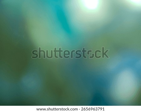 abstract, blurred background featuring a blend of muted blues, greens, and grays, with subtle light flares. It evokes a serene, slightly aquatic or natural ambiance.