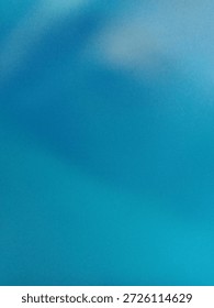 Abstract blurred background featuring smooth gradients of teal, turquoise, and deep blue colors. The out-of-focus image creates a soft, dreamlike texture with ample copy space, perfect for use as a digital wallpaper, website backdrop, or presentation template.