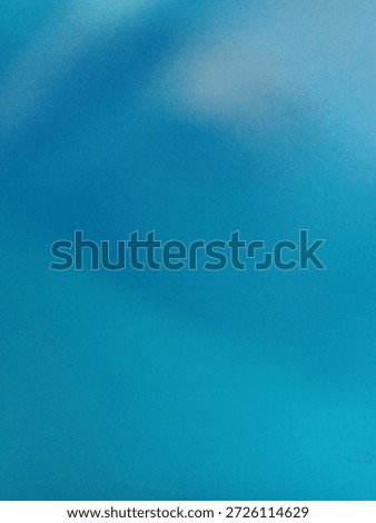 Abstract blurred background featuring smooth gradients of teal, turquoise, and deep blue colors. The out-of-focus image creates a soft, dreamlike texture with ample copy space, perfect for use as a digital wallpaper, website backdrop, or presentation template.