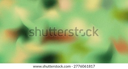 Abstract blurred background featuring a soft blend of green, orange, and yellow tones with a grainy texture, perfect for modern digital design projects.