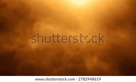 Abstract blurred background featuring warm golden light rays and soft hazy textures in a glowing atmospheric composition