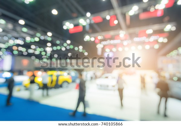 Abstract blurred background image of crowd people at\
cars exhibition show