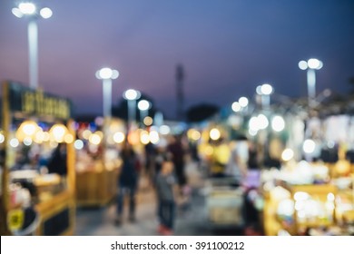 Abstract blurred background of night market - Shutterstock ID 391100212