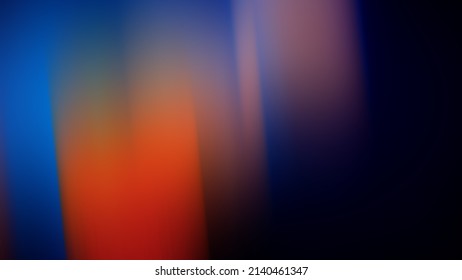 Abstract blurred background of orange spots stripes on a dark blue background. Background for design.