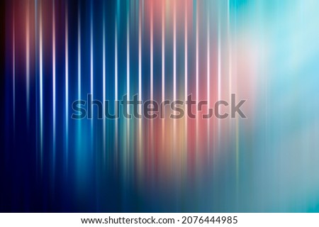 Abstract blurred background, parallel light lines on a dark blue background. Background for design.