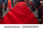 abstract blurred background with red carpet and celebrities