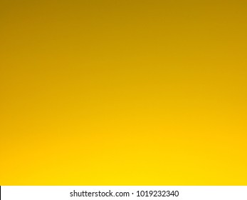Abstract blurred background yellow color with smooth gradient for banner header or sidebar graphic.Creative by mobile phone camera.