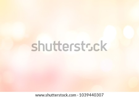 abstract blurred beautiful glowing pastel color of pink and yellow gradient background with double exposure bokeh light concept for wedding card design or presentation or other