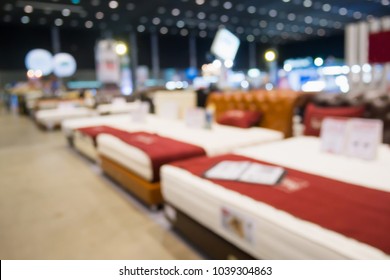 Abstract Blurred Bed For Sale Show In Furniture Home And Decor Store Background