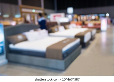 Abstract Blurred Bed For Sale Show In Furniture Home And Decor Store Background