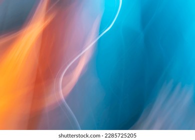 abstract blurred blue, pink, maroon, red and orange background - Powered by Shutterstock