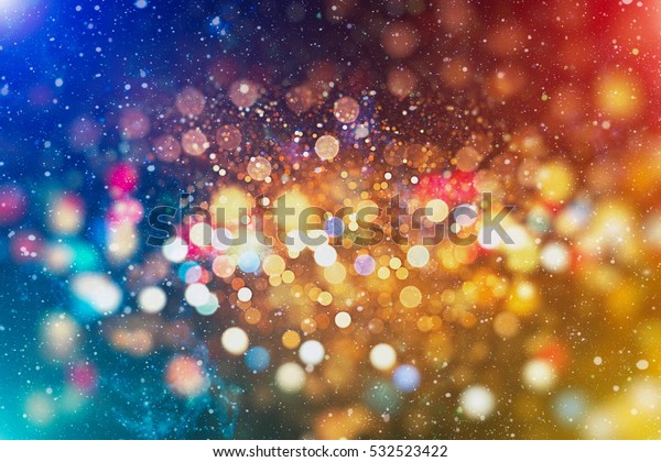 abstract blurred of blue and silver glittering shine\
bulbs lights background:blur of Christmas wallpaper decorations\
concept.xmas holiday festival backdrop:sparkle circle lit\
celebrations display .