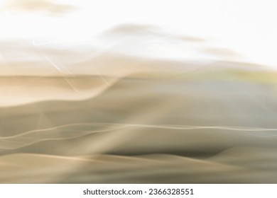 abstract blurred blue, yellow, grey and white sunrise background